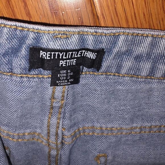 PrettyLittleThing Petite Light Wash Denim Mini Skirt - Picture 1 of 5